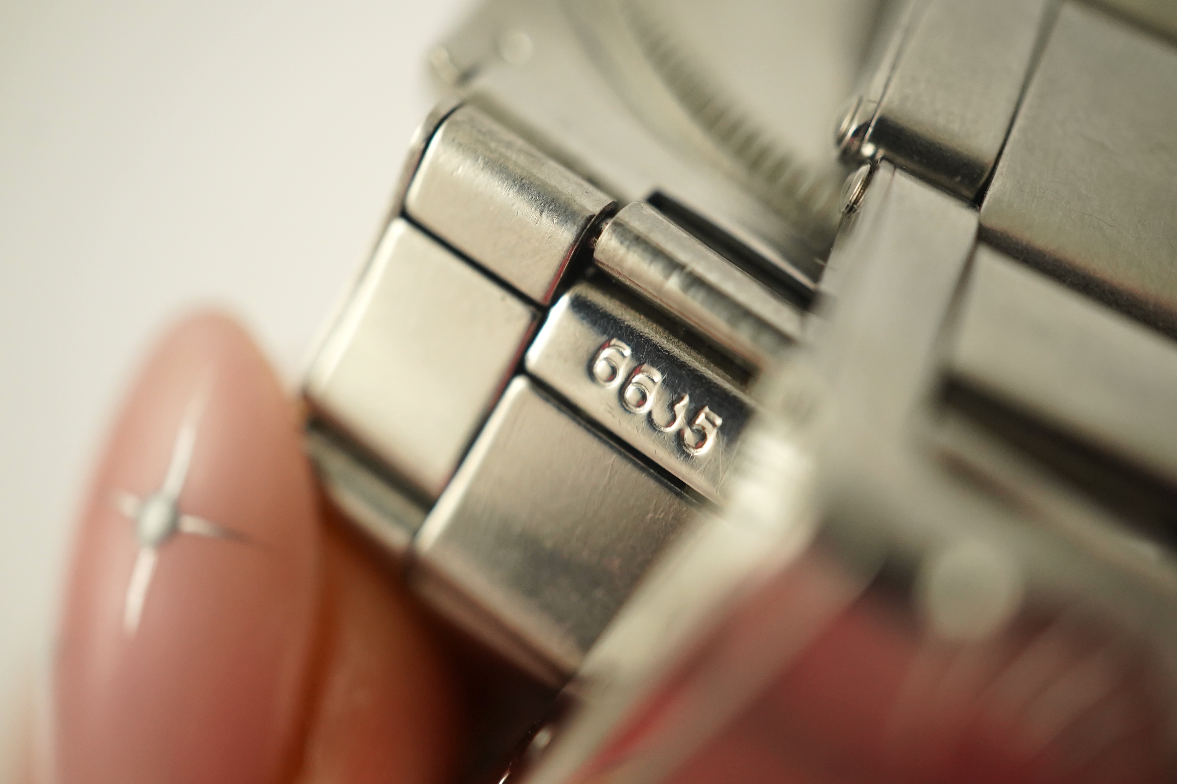 A gentleman's 1964 stainless steel Rolex Oyster Perpetual Explorer Super Precision wrist watch, on a stainless steel Rolex bracelet numbered 6635